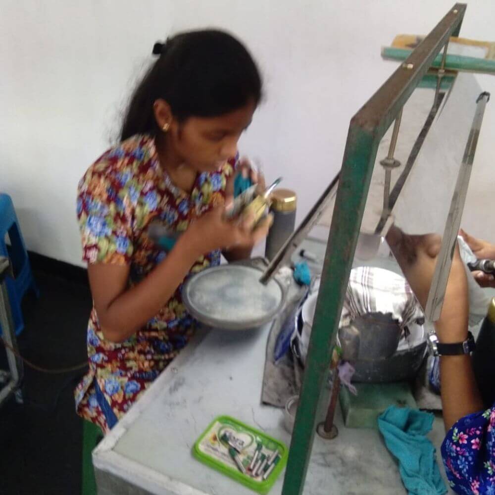 Our skilled workers working on a gem cutting process